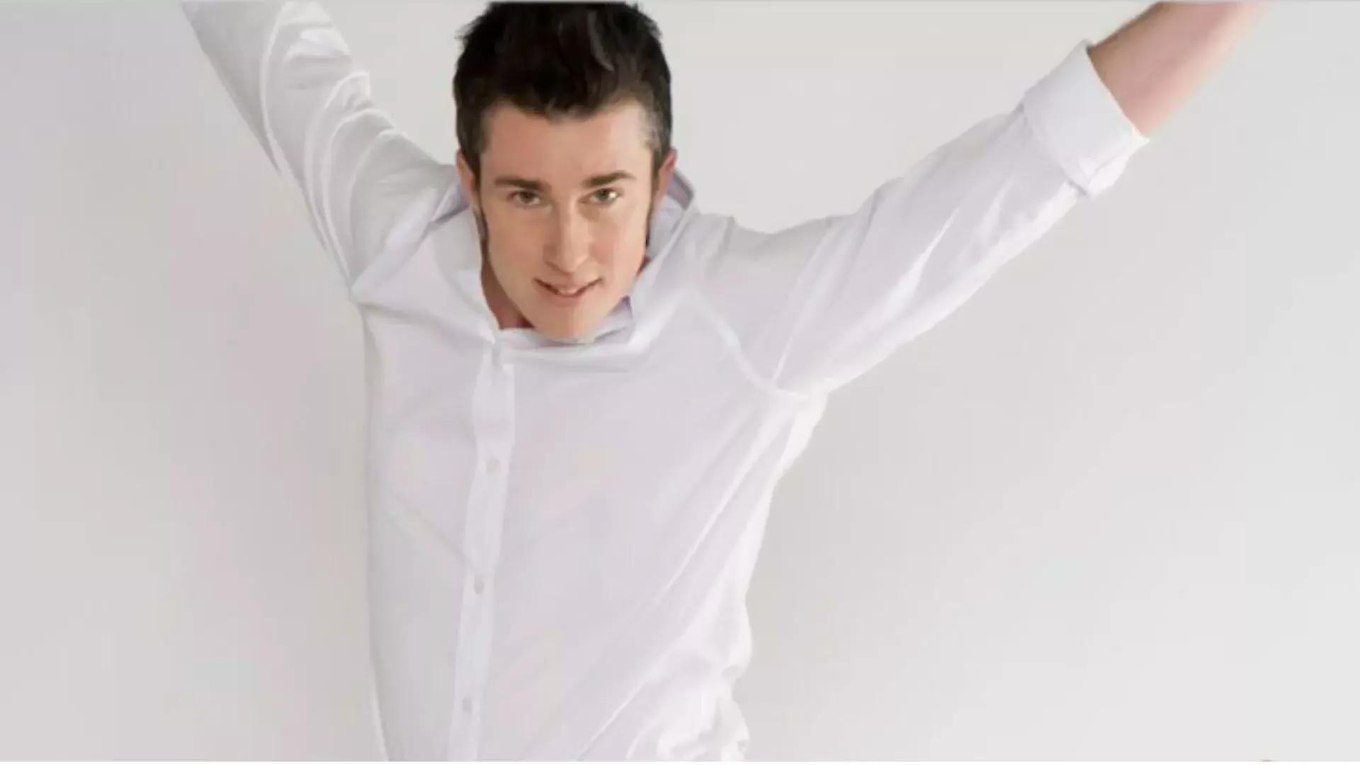 Image of person in white shirt jumping in frame