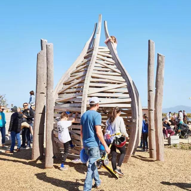 Families play at The Outpost in the Presidio