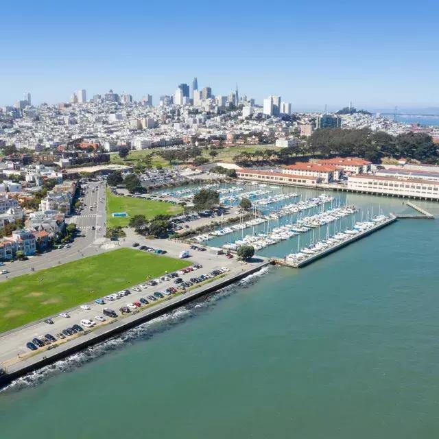 Aerial of Fort Mason with the San Francisco skyline in the distance.