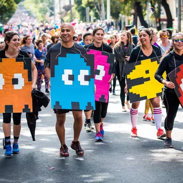 Runners dressed in Pac Man costumes for Bay to Breakers Race SF