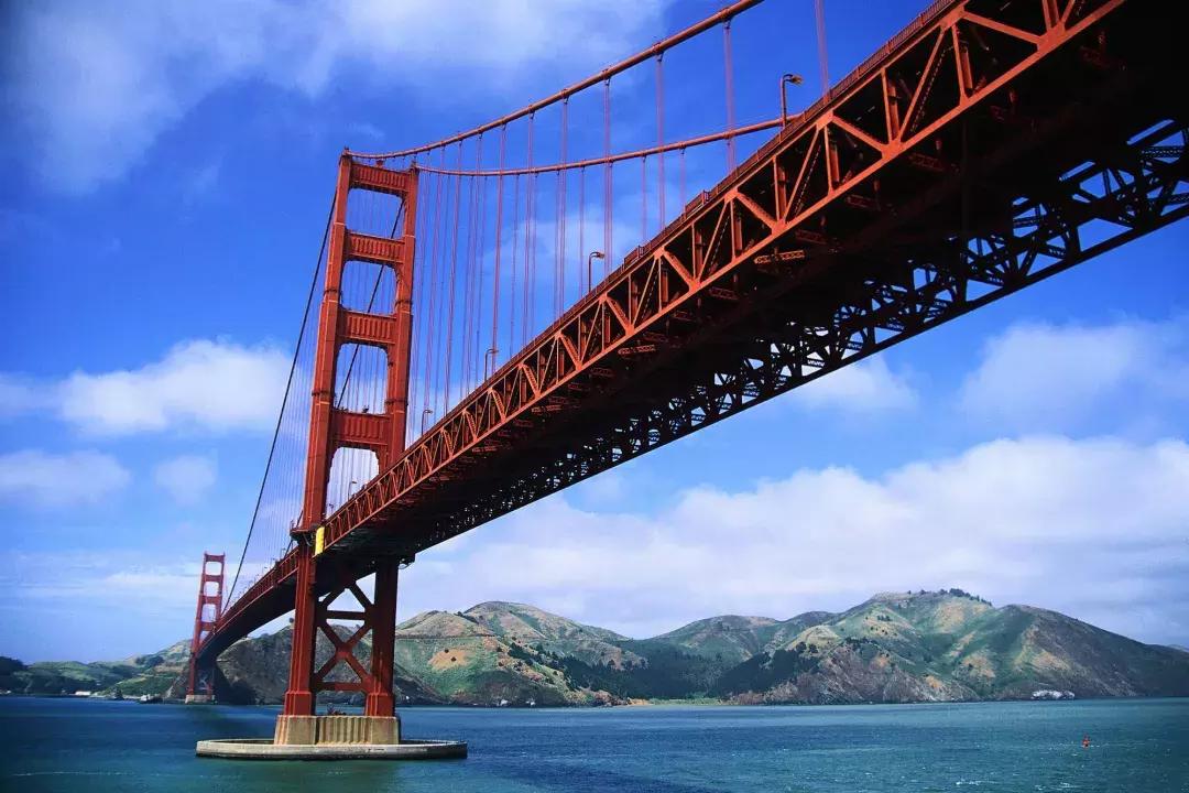 The iconic Golden Gate Bridge is seen from below. San Francisco, California.